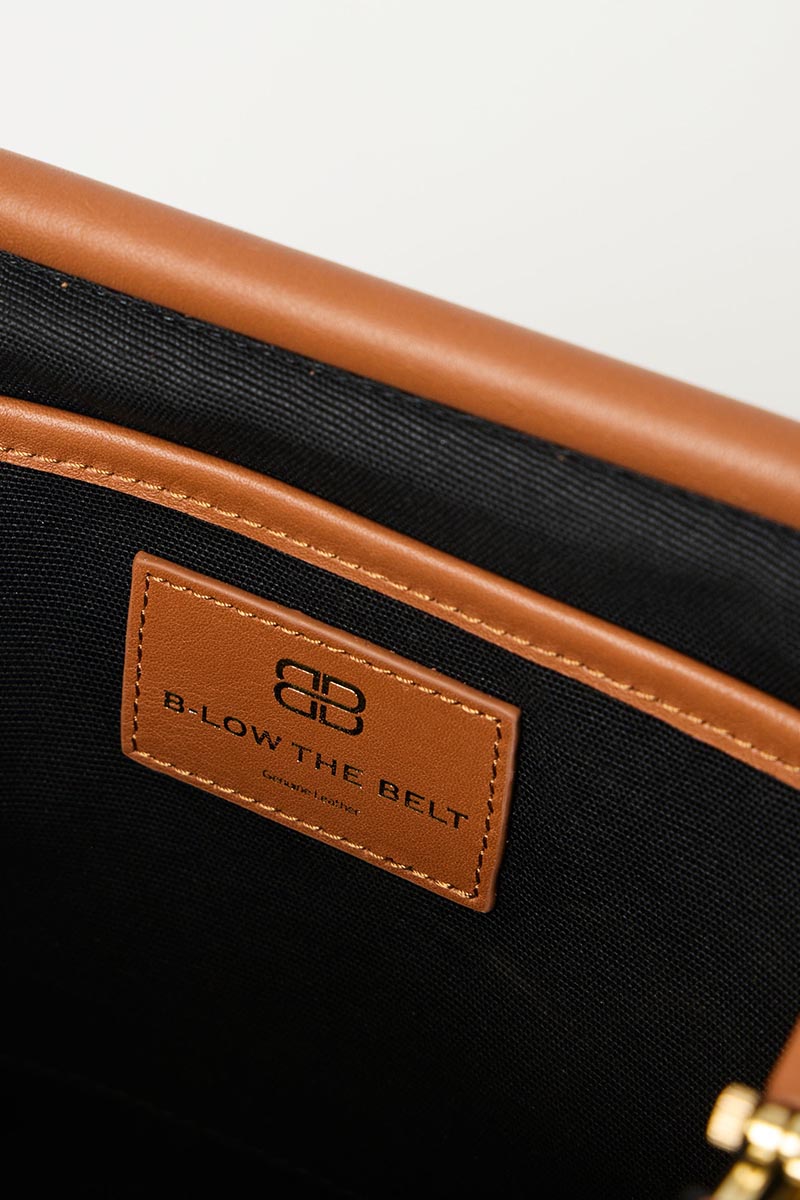 ROWE SUEDE CLUTCH